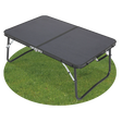 Quest Superlite Witney low folding camping table with black tabletop and legs extended on grass